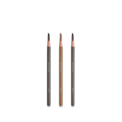 Three makeup brushes with black and bronze handles on a white background