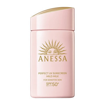 A pink stick sunscreen lotion with the brand ANESSA printed on it, labeled as 'Perfect UV Sunscreen Mild Milk' for sensitive skin, with SPF 50+ protection.