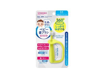 Wakodo baby toothbrush packaging on a white background