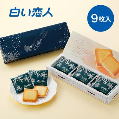 A box of Ishiya Shiroi Koibito Langue de chat Cookies with nine pieces displayed in a decorative packaging.