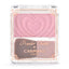 A compact pan of Canmake Powder Cheeks with a pink heart-shaped design on the lid, containing a blush-colored powder and a brush.