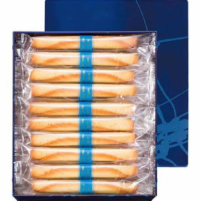 Packaging of YOKUMOKU Cigare Cookies, displaying the cookies inside a transparent wrapper with blue accents.